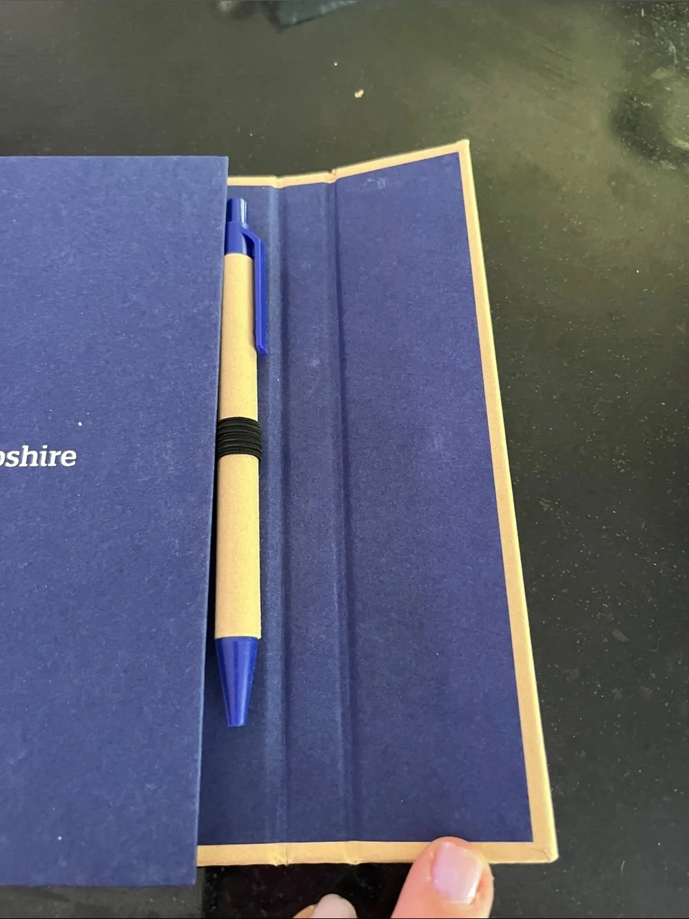 Blue Spiral Notebook with Tan Elastic SNHU